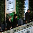 Delegates observed a minute's silence at the meeting's start