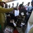 Results from 120,000 polling stations in 36 states where Nigerians voted for president were expected to trickle in to the capital Abuja after being collated at the state and local levels