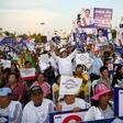 Supporters of the Phalang Pracharat party -- which has thrown its lot in with the Thai junta -- attend a campaign rally in Chonburi province ahead of the country's general election