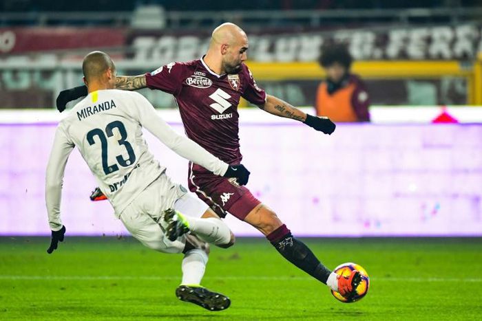 Torino's Italian forward Simone Zaza (R) scored before being sent off in Turin.