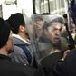 Algerian students scuffle with security forces during a protest in the capital Algiers against ailing President Abdelaziz Bouteflika's bid for a fifth term, on February 26, 2019