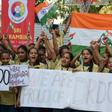 Indian students celebrate after the destruction of a low-orbiting satellite in a test of a new missile
