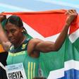 Caster Semenya celebrates with the South African flag after winning the women's 800m during the African Athletics Championships in Nigeria in August 2018