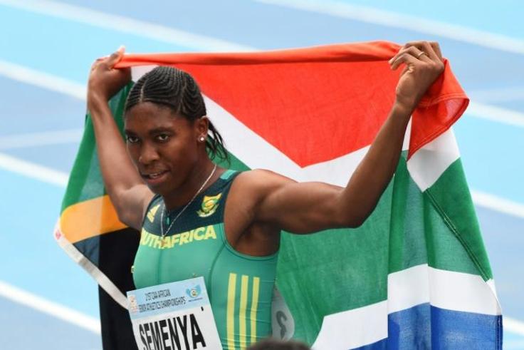 Caster Semenya celebrates with the South African flag after winning the women's 800m during the African Athletics Championships in Nigeria in August 2018