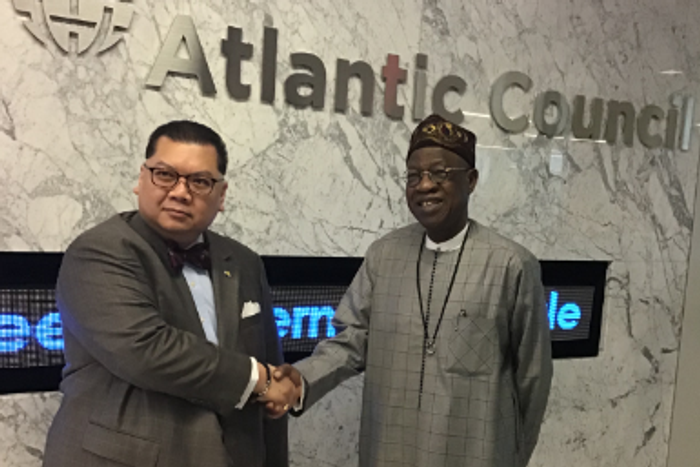 Mr Peter Pham, the Deputy President Think Tank of the Atlantic Council and Alhaji Lai Mohammed, the Minister Of Information and Culture, at the Atlantic Council Office in Washington, USA [nan]