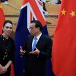 New Zealand Prime Minister Jacinda Ardern listens to Chinese Premier Li Keqiang during a signing ceremony after their meeting at the Great Hall of the People in Beijing on Monday