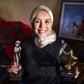 Bouchra Baibanou at home with two of her mountaineering trophies in the Sidi Moussa district of Sale near the capital Rabat
