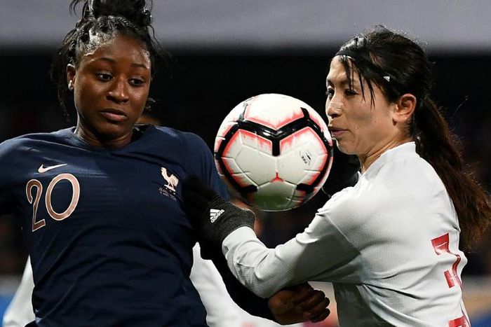 Eye on the ball: France midfielder Kadidiatou Diani vies with Japan's Aya Sameshima
