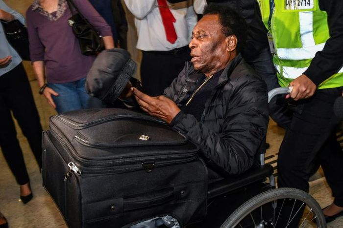 Pele arrived back in Brazil after a six-day hospital stay in Paris
