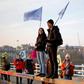 Climate protesters block off a bridge and major road in London, bringing parts of the city to a standstill