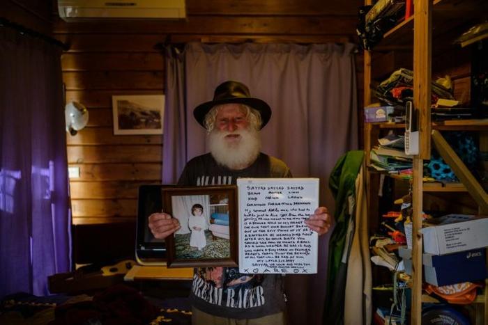 John Milne with the letter he wrote to his son Sayyad, one of 50 people killed in New Zealand’s twin mosque massacre