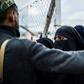 Guards are instructed to confiscate unusually valuable items and mobile phones from those in the camp