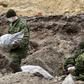 Exhumation works that began after the chance discovery last month have to date uncovered remains from 790 bodies