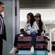 Lawyer Robert Tibbo greets Vanessa Rodel and her daughter Keana as the pair arrive in Canada at the Toronto airport on a flight from Hong Kong on March 25, 2019