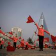 The displays of sweeping, flowing gestures –- accompanied by disciplined looks -– are intended to motivate North Korean workers