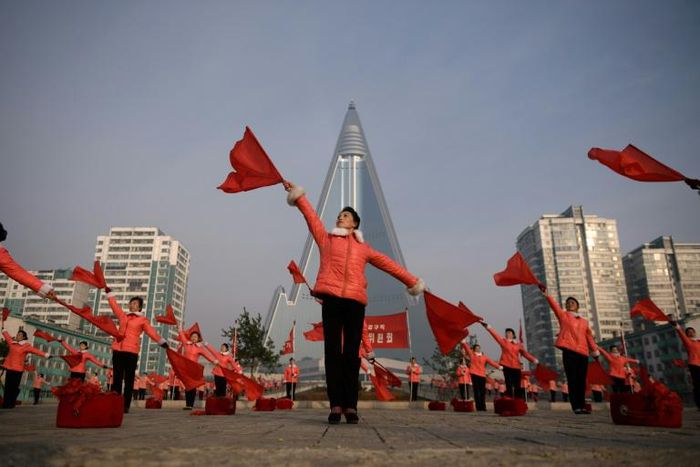 The displays of sweeping, flowing gestures –- accompanied by disciplined looks -– are intended to motivate North Korean workers