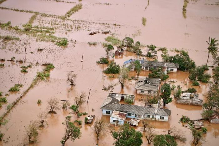 A picture shows houses in a flooded area of Buzi, central Mozambique after the passage of cyclone Idai.