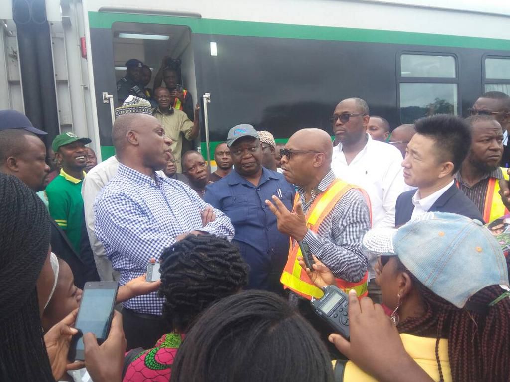 Transport Minister, Rotimi Amaechi, queries contractors on slow pace of the construction of Train Stations at the Itakpe-Ajaokuta-Warri rail line.