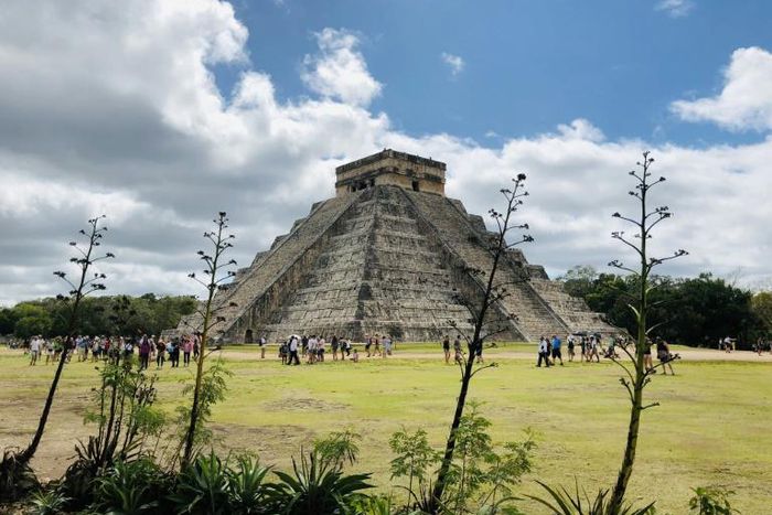 Archaeologists have discovered a cave filled with hundreds of artifacts beneath the ruins of the Mayan city of Chichen Itza in Mexico