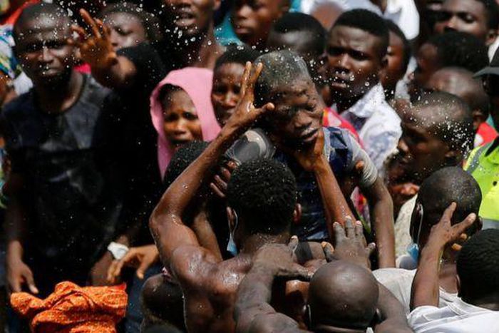 Rescue teams are on the site to rescue the pupils trapped in the collapsed building (REUTERS)
