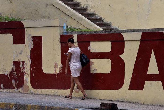 Cubans like this woman pictured in Havana on March 17, 2019, have seen an explosion of mobile internet usage