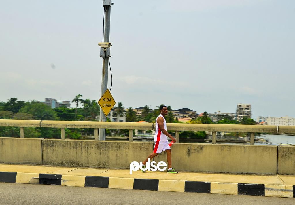 A man takes a walk after running on the Ikoyi-Lekki Bridge (Pulse)