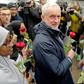 Opposition Labour Party leader Jeremy Corbyn holds a rose as he arrives at Finsbury Park mosque in north London to mark national 'Visit my Mosque Day' on March 3, 2019