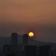 The sun sets in Caracas during a partial power cut on March 25, 2019