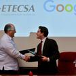 Cuban state-run Telecommunications Company ETECSA's investments vice-president, Luis Adolfo Iglesias Reyes (L), and the head of Google Cuba, Brett Perlmutter (R), shake hands after signing a memorandum of understanding at the Miramar Trade Center in Ha...