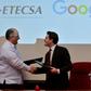 Cuban state-run Telecommunications Company ETECSA's investments vice-president, Luis Adolfo Iglesias Reyes (L), and the head of Google Cuba, Brett Perlmutter (R), shake hands after signing a memorandum of understanding at the Miramar Trade Center in Ha...