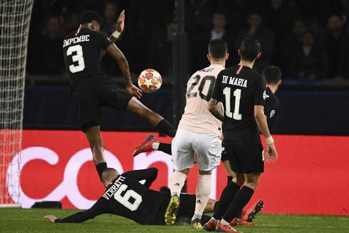 PSG's Presnel Kimpembe conceded a penalty for handball after a VAR review in a 3-1 Champions League defeat to Manchester United on Wednesday