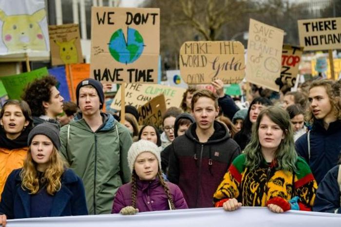 Swedish climate activist Greta Thunberg (centre) should get this year's Nobel Peace Prize, Norwegian lawmakers say