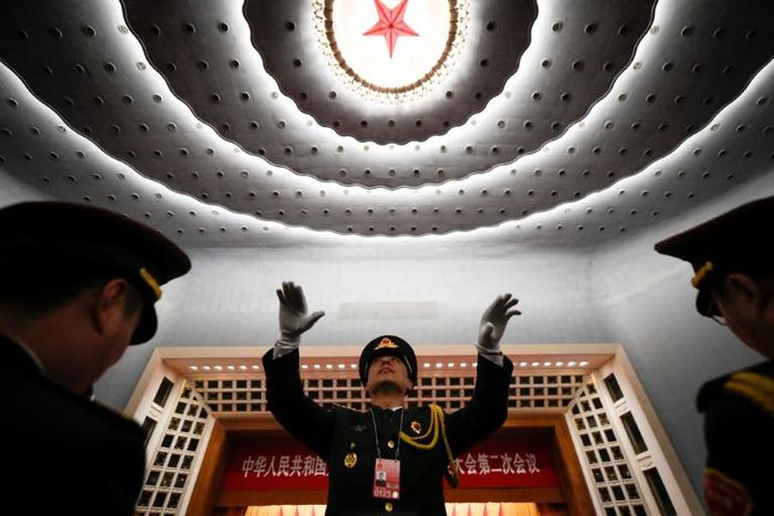 The National People's Congress meets annually in Beijing with many decisions made in advance -- but China's propaganda apparatus has wasted no time in hailing its "system of democracy"