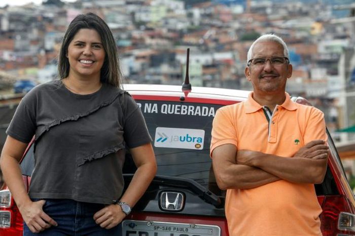 Brazilian Alvimar da Silva (R), with daughter Aline Landim, created JaUbra (Uber of slum) to serve poor Sao Paulo communities that Uber avoids