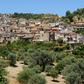 Lucano made a name for himself by welcoming migrants to Riace to tackle the dwindling population
