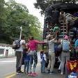 Venezuelan migrants (pictured February 2019) climb on a truck on the road from Cucuta to Pamplona in Colombia, which has received about a third of 3.7 million Venezuelan refugees