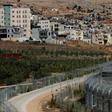 The village of Majdal Shams (L)in the Golan Heights, an area that US refers to as "Israeli-controlled" rather than "Israeli-occupied" in its latest annual human rights report