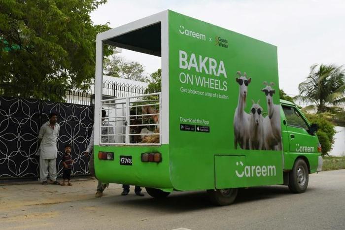 A Careem cab service delivers goats ahead of the Muslim festival Eid al-Adha, in Karachi, Pakistan in 2017