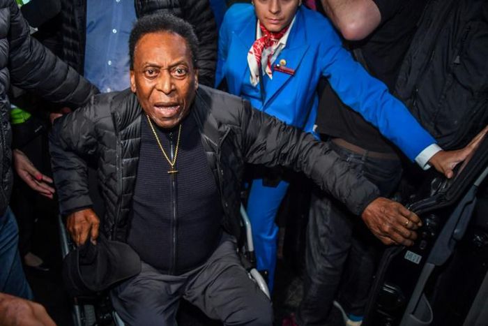 Brazilian football great Edson Arantes do Nascimento, known as Pele, has been released from hospital after surgery to remove a kidney stone; he is pictured here arriving in Brazil on April 9, 2019