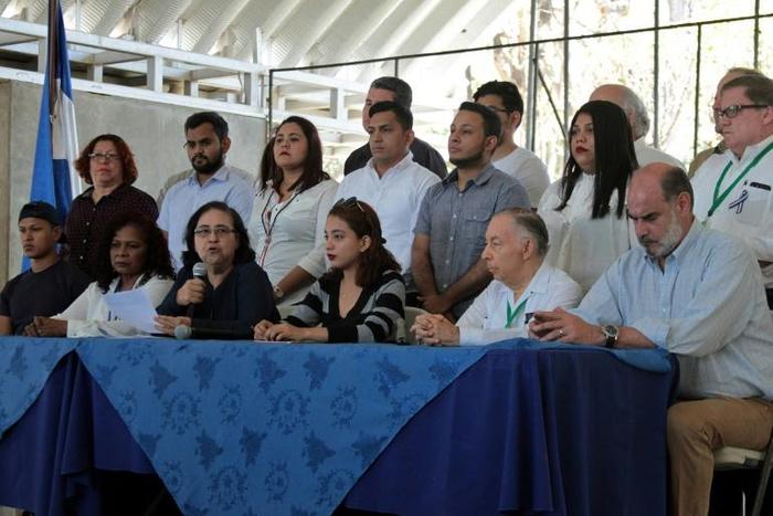 Nicaraguan Azaleah Solis (3-L), member of the opposition Civic Alliance for Justice, speaks during a press conference in Managua on March 19, 2019