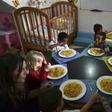 Children enjoy a meal at a shelter in Maracay, north-central Venezuela -- UNICEF estimates that the number of Venezuelan children in need of aid will more than double in 2019 to reach 1.1 million