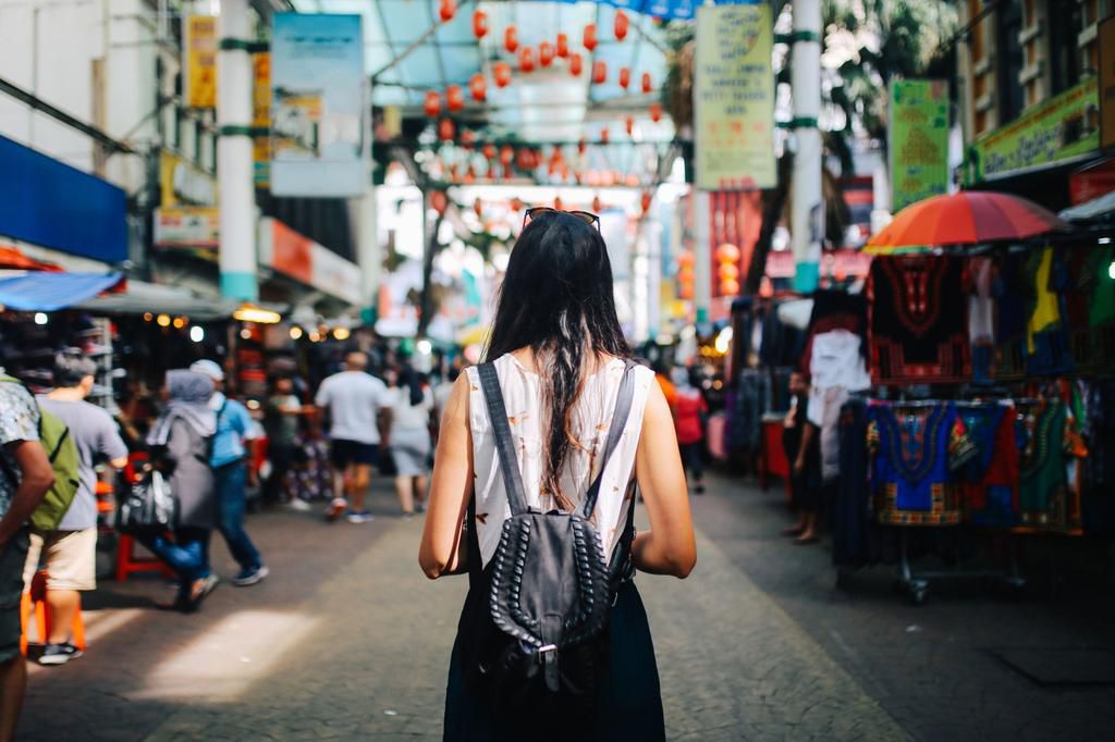 Young traveler woman in Kuala Lumpur Chinatown district