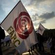 People hold flags of the Common Alternative Revolutionary Force (FARC) party during a protest against a reform proposed by the government for the Special Jurisdiction for Peace (JEP) in Bogota, on March 13, 2019.