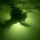 A diver explores Vietnam's Son Doong cave, the world's largest cave by volume, big enough to house a New York city block -- including 40-storey skyscrapers