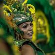 A reveller of "Unidos de Vila Maria" samba school performs during the second night of carnival in Sao Paulo