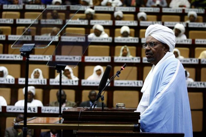 Sudanese President Omar al-Bashir addresses parliament in the capital Khartoum for the first time since he imposed a state of emergency across the country on February 22 in the face of anti-government protests