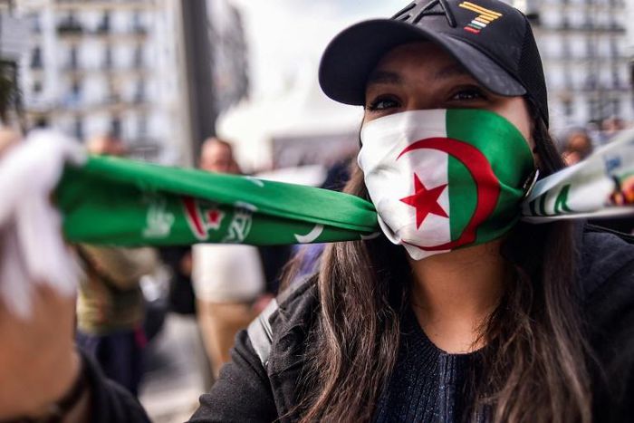 Algerian students demonstrate with national flags in the capital on Sunday against ailing President Abdelaziz Bouteflika's bid for a fifth term