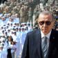 Turkish President Recep Tayyip Erdogan (C) described the vote as marred by "organised crimes" and had called for the vote to be annulled because of alleged irregularities