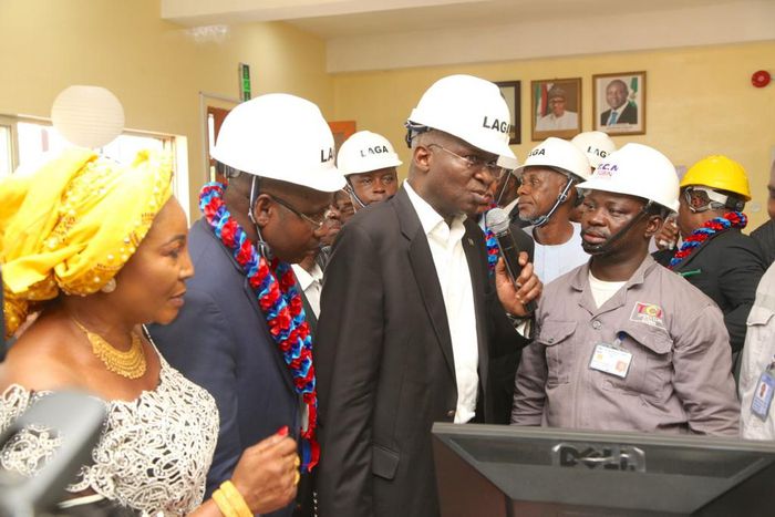 Minister for Power, Works and Housing Babatunde Raji Fashola commissioning a power project