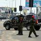 International observers expressed concern after men in military uniform surrounded a vote counting centre in the capital of southern Rivers State